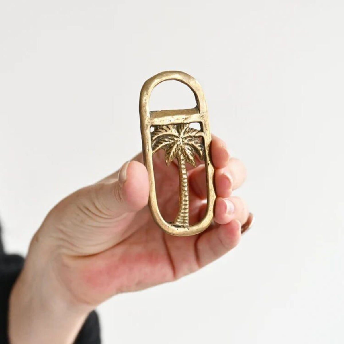 The Golden Palm Bottle Opener